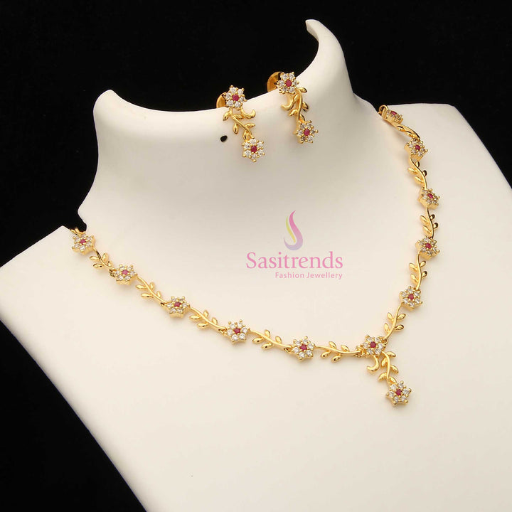 Charming white and ruby toned American Diamond floral vine necklace set with micro gold touch – a timeless pick for bridal soirees – Sasitrends