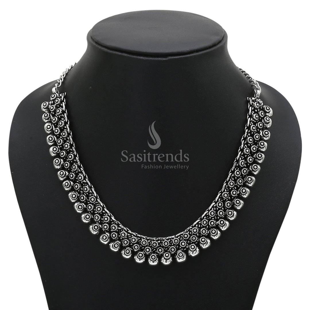 Classic oxidised silver Madhura Jhumka jewellery set with ethnic motif necklace and fusion touch for timeless grace and rustic charm - Sasitrends

