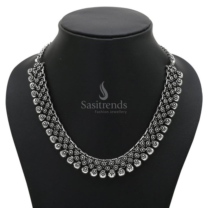 Madhura Jewellery Set with Signature Jhumka in Oxidised Silver and Antique Gold
