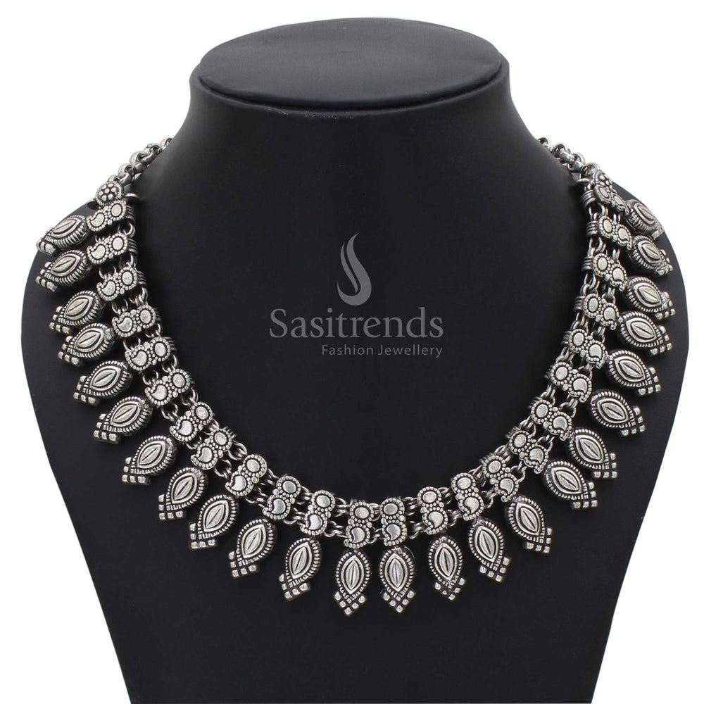 Elegant Kolhapuri oxidised silver necklace design for women and girls, blending traditional craftsmanship with fusion jewellery styling for festive wear - Sasitrends