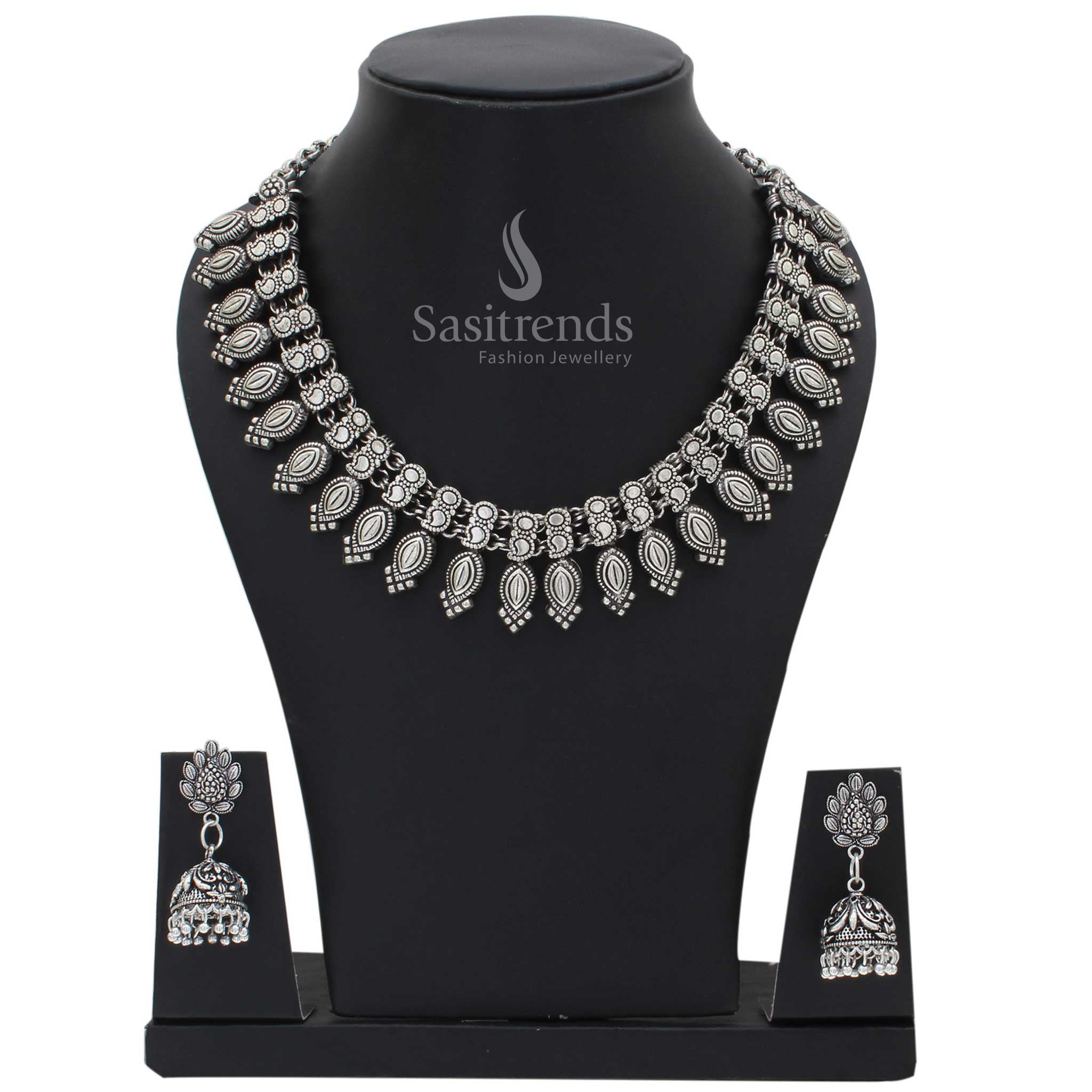 Rustic oxidised German silver Kolhapuri necklace and earrings jewellery set with vintage coin motifs and bohemian fusion styling for traditional luxe - Sasitrends