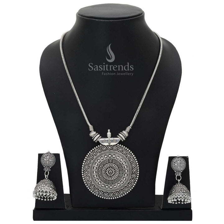 Roopasi oxidised silver chakra pendant chain jewellery set with tribal motif and bohemian jhumka earrings for fusion looks and festive finesse - Sasitrends
