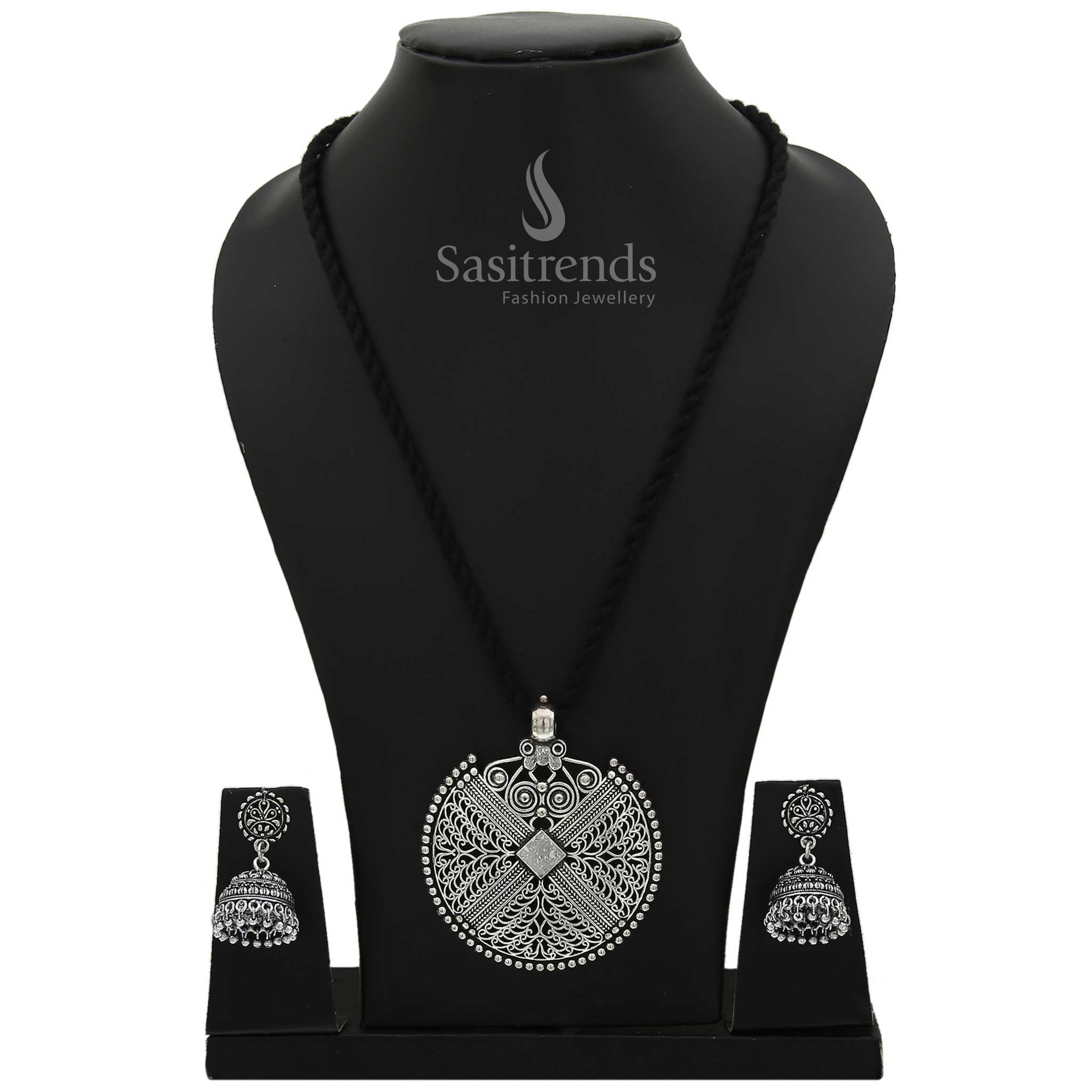 Elegant oxidised silver thread necklace jewellery set with German silver pendant in artisanal engraved floral design and fusion wear charm - Sasitrends