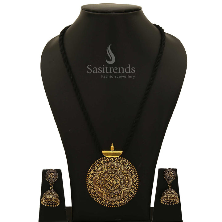 Radiant Oxidised Antique Gold Niranjana Pendant And Jhumka Jewellery Set With Long Black Thread And Detailed Floral Engravings For Festive Wear - Sasitrends