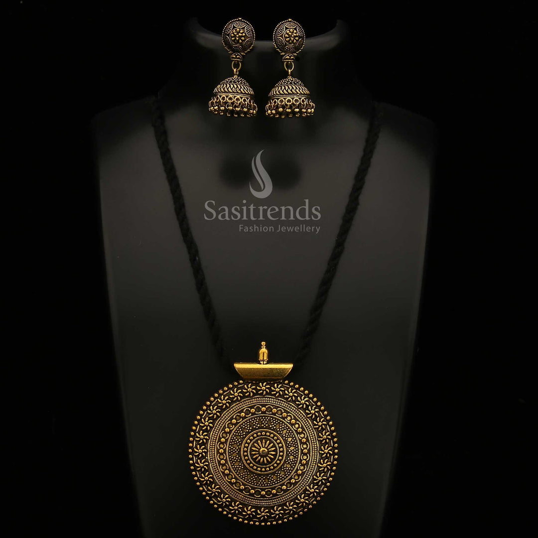 Majestic Oxidised Antique Gold Tone Niranjana Pendant And Jhumka Jewellery Set With Black Thread Chain And Traditional Carved Designs For Wedding And Occasions - Sasitrends