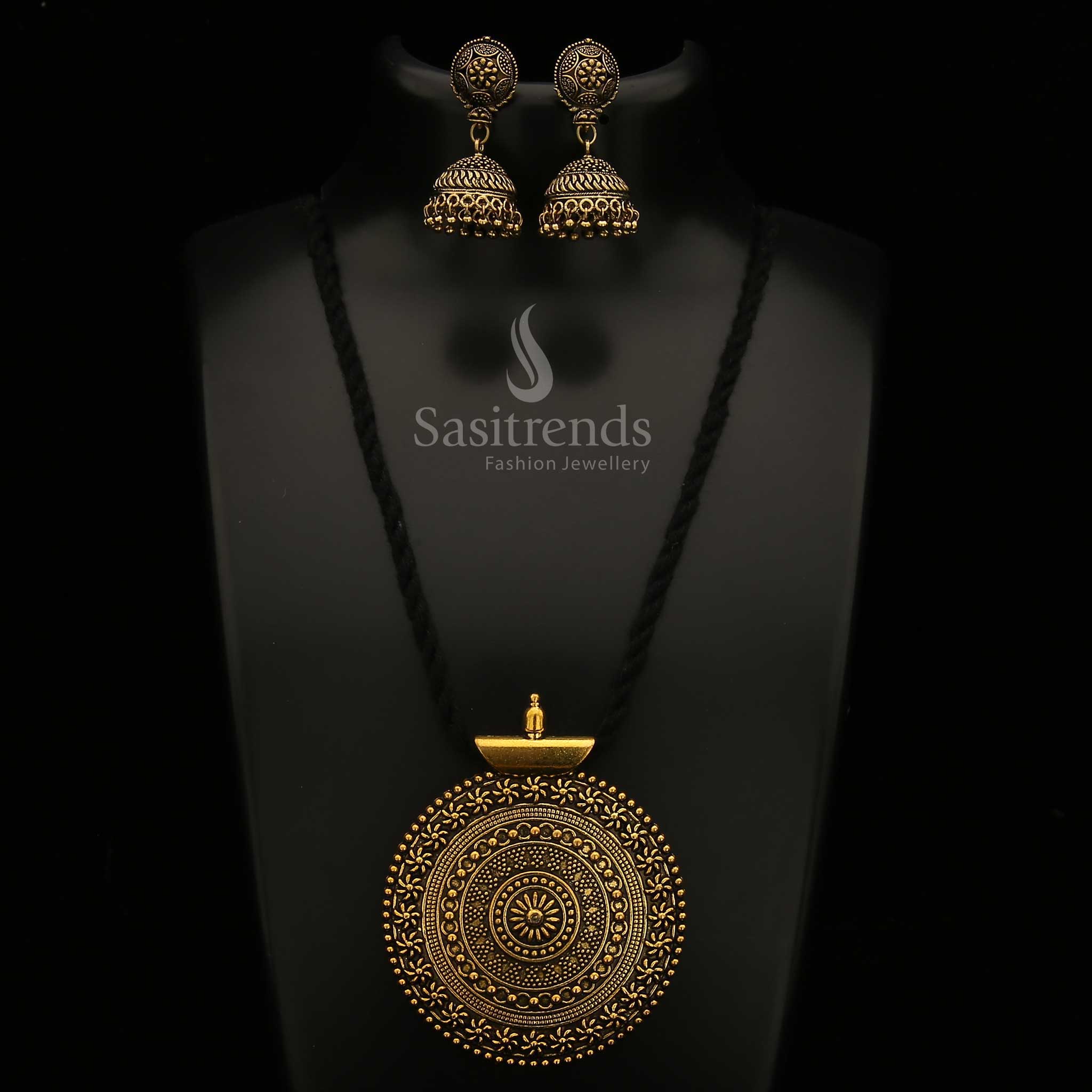 Majestic Oxidised Antique Gold Tone Niranjana Pendant And Jhumka Jewellery Set With Black Thread Chain And Traditional Carved Designs For Wedding And Occasions - Sasitrends