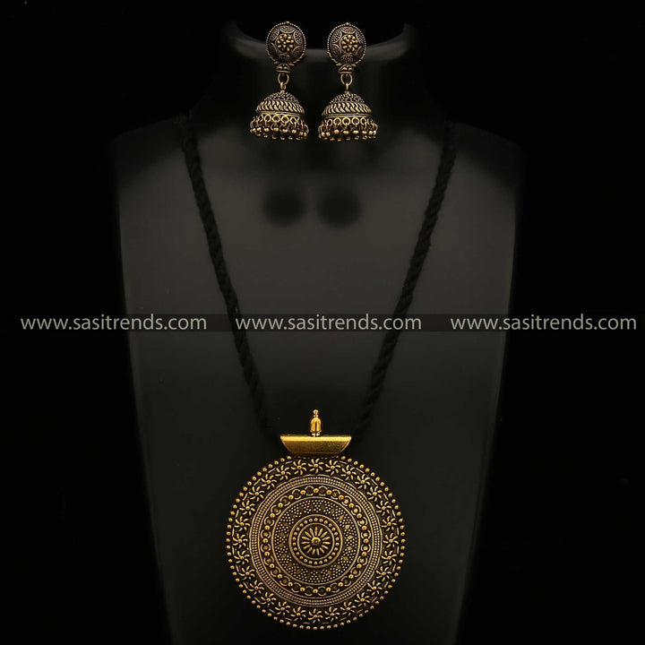 Niranjana Antique Gold Pendant on Black Thread with Jhumka Earrings Jewellery Set Navarathiri Elegance