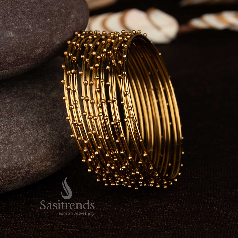 Stunning beaded texture antique gold plated bangle set for office and party wear sasitrends