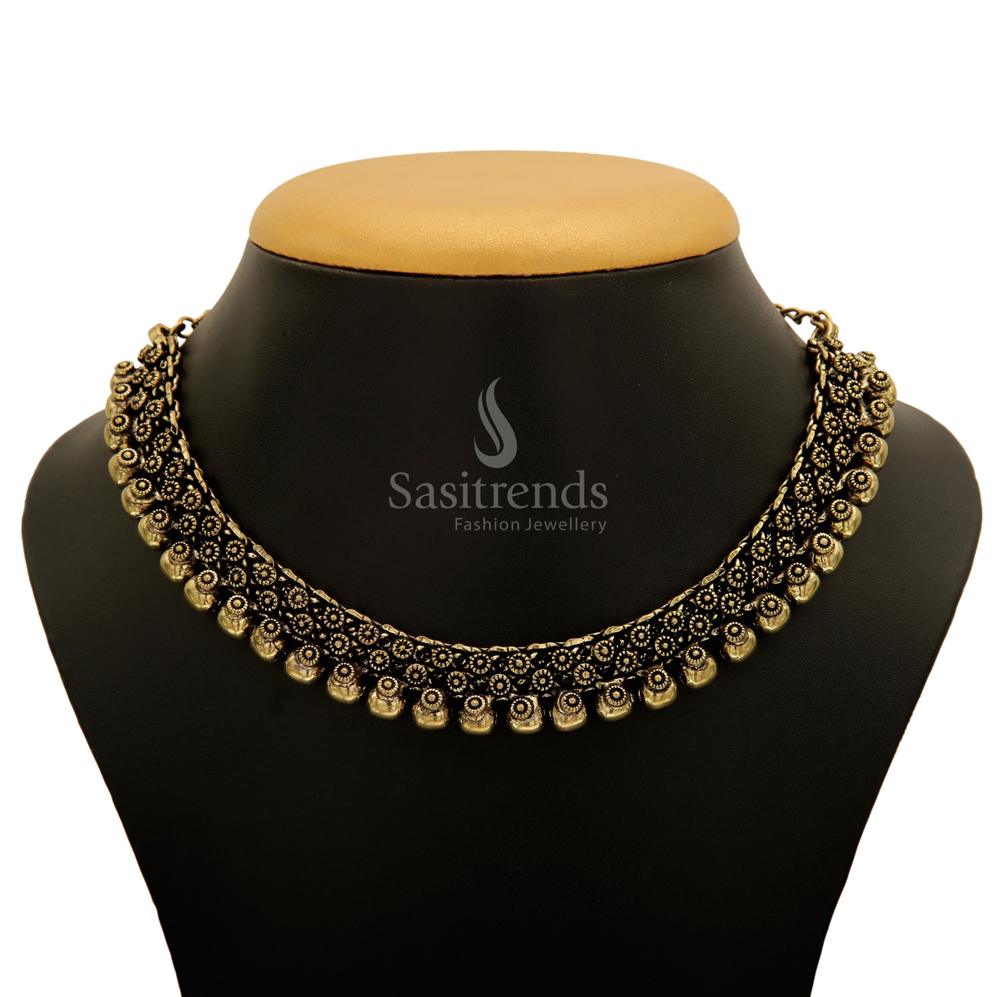 Elegant antique gold Madhura Jhumka jewellery set with sculpted goddess art and finely carved temple elements for celebratory finesse - Sasitrends