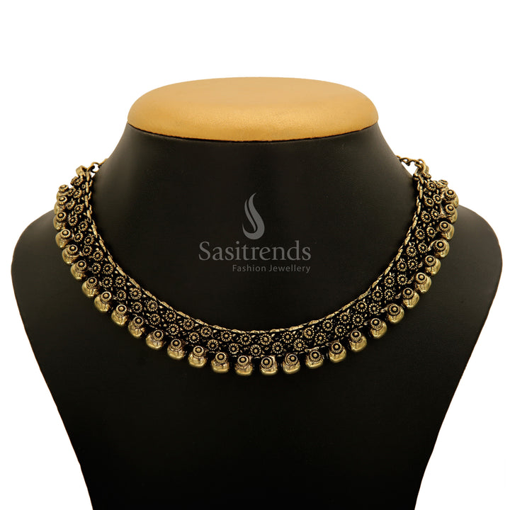 Elegant antique gold Madhura Jhumka jewellery set with sculpted goddess art and finely carved temple elements for celebratory finesse - Sasitrends