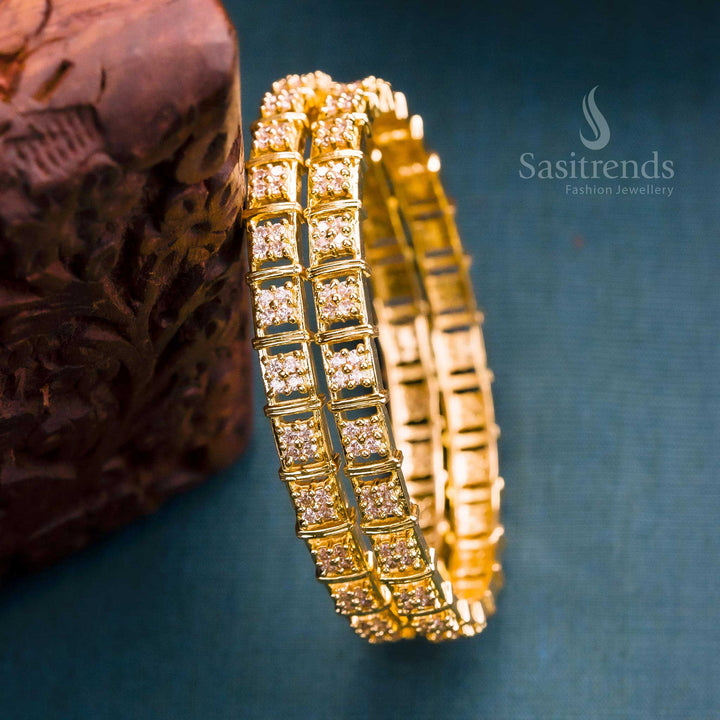 Luxury classic traditional floral motif micro gold plated bangles pair highlighted with sparkling white American diamond stones, radiating grand elegance and regal jewellery design – Sasitrends