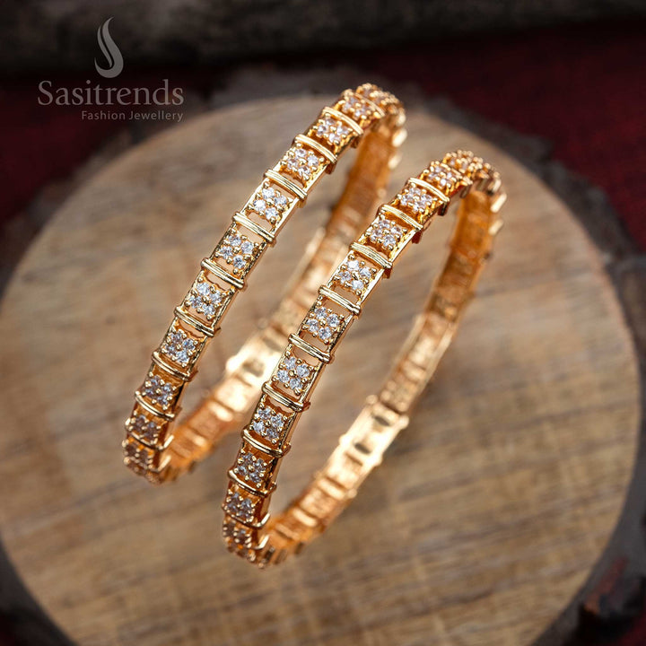 Luxury micro gold floral motif bangles pair, crafted with premium white American diamonds, a classic traditional jewellery addition for women - Sasitrends