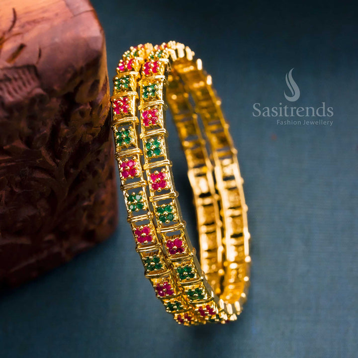 Luxurious ruby-green AD floral motif bangles, micro gold-polished with intricate craftsmanship - Sasitrends