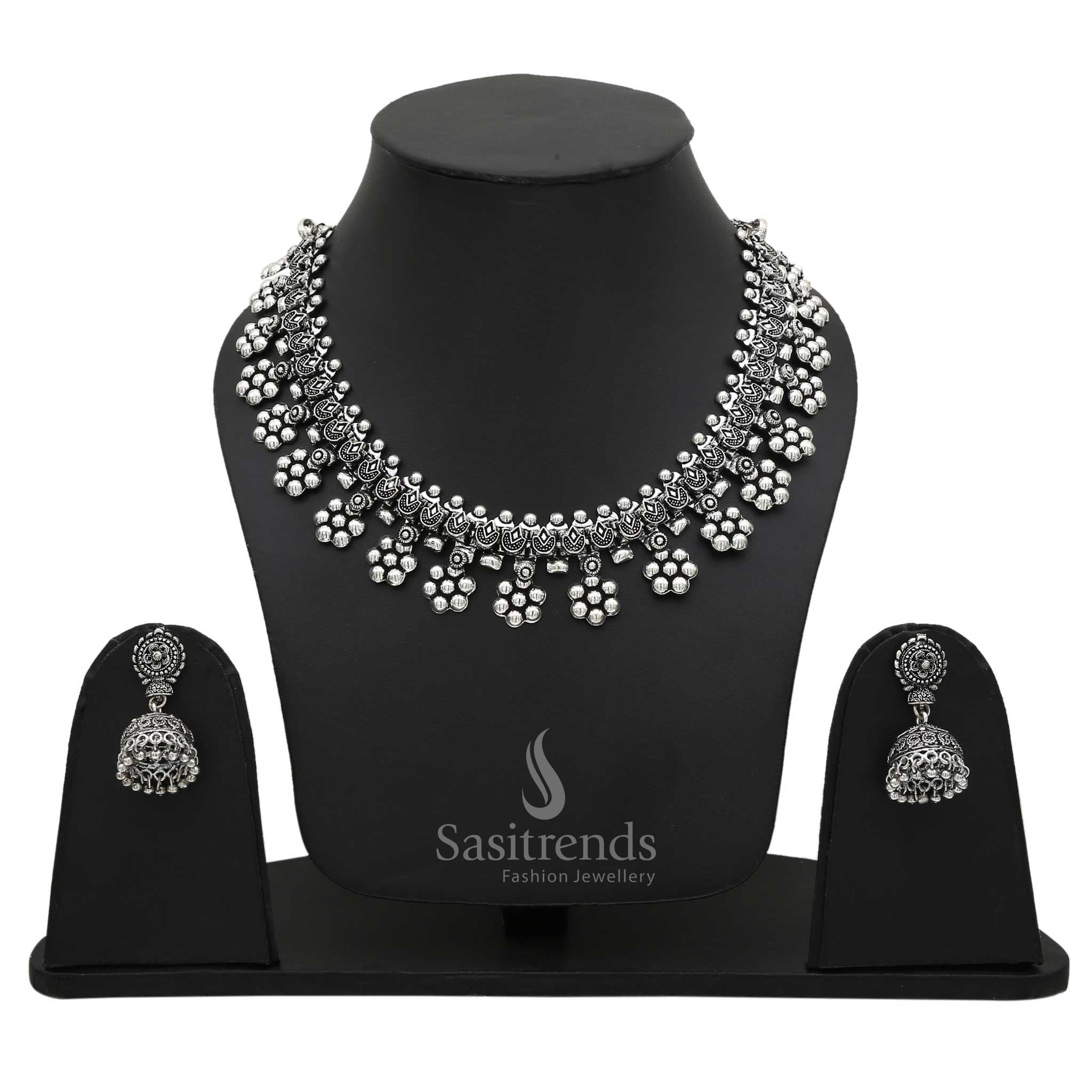 Vintage Oxidised Silver Floral Motif Necklace with Dangling Jhumka Earrings—an artistic handcrafted jewellery set that blends beautifully with cultural and fusion attire – Sasitrends