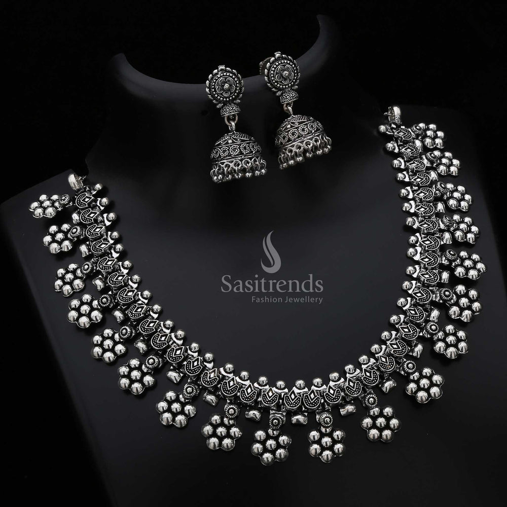 Charming Oxidised Silver Floral Design Necklace Jewellery Set with matching Jhumka earrings—perfect for traditional folk wear, graceful ethnic gatherings, and festive celebrations – Sasitrends