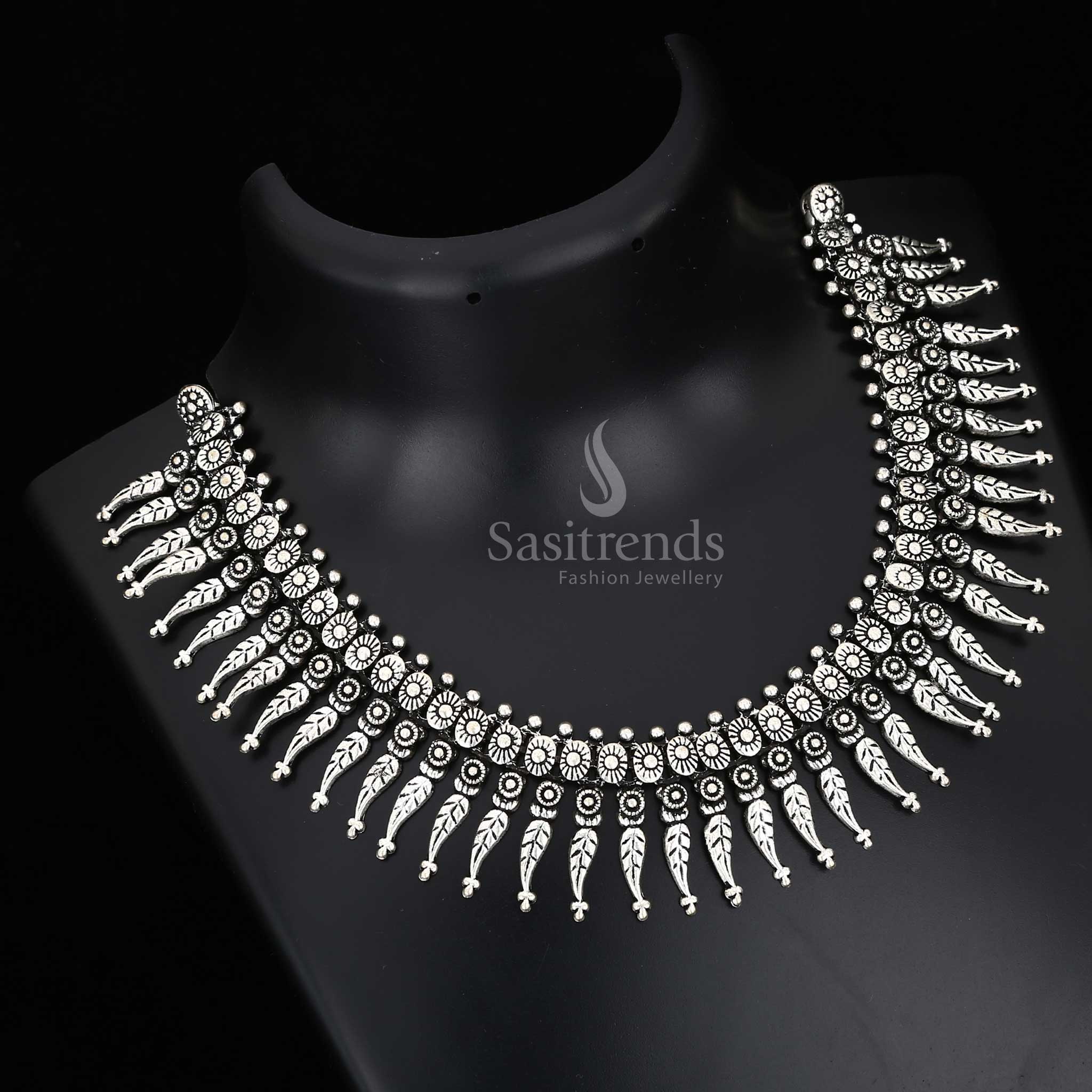 Echoing traditions in every curve – a Kolhapuri oxidised necklace with antique drops and a tribal fusion pendant, crafted for heritage jewellery styling – Sasitrends