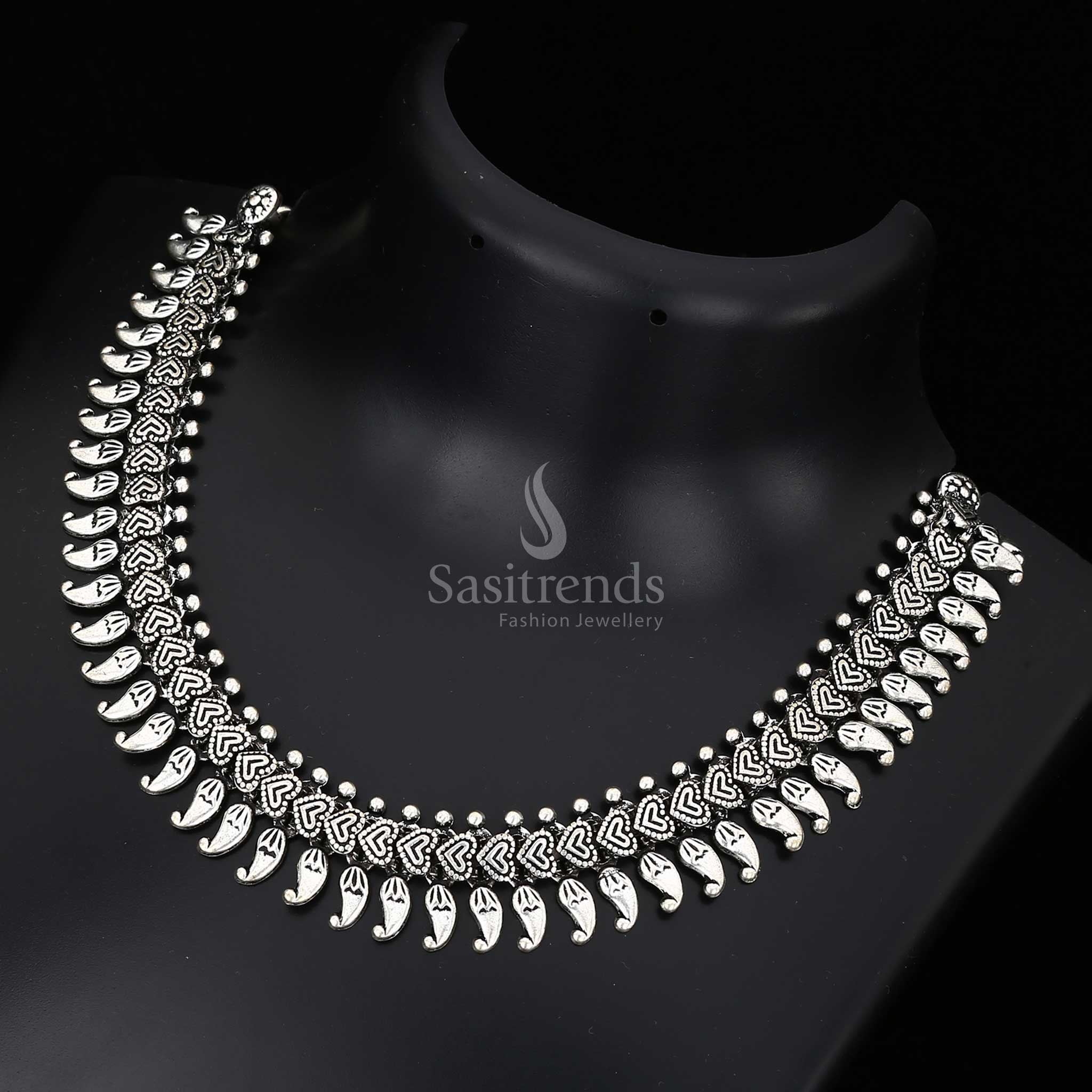 Sacred threads of heritage – this Kolhapuri oxidised fusion necklace features an antique symbolic pendant and classic folk jewellery construction – Sasitrends