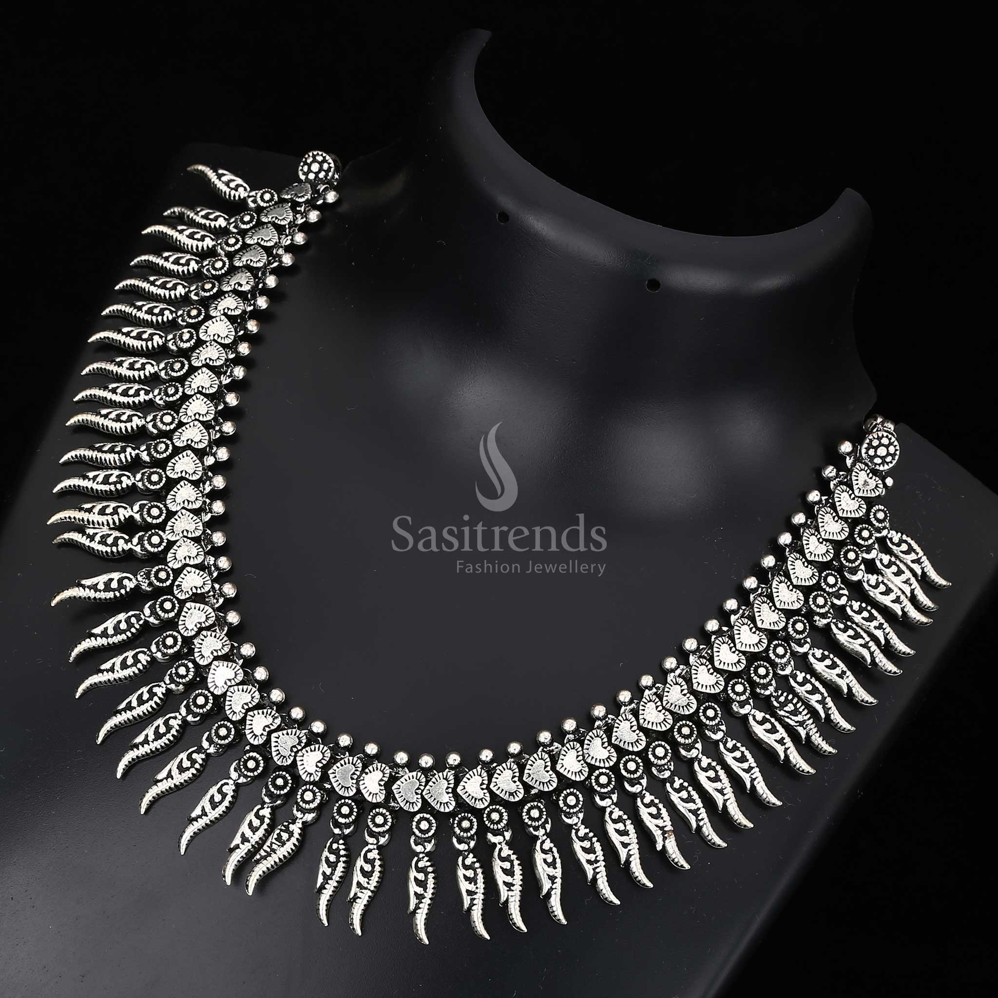 Vintage veins of legacy – oxidised silver Kolhapuri necklace with deep-carved pendant and folk aura, perfect for cultural and festive jewellery wear – Sasitrends