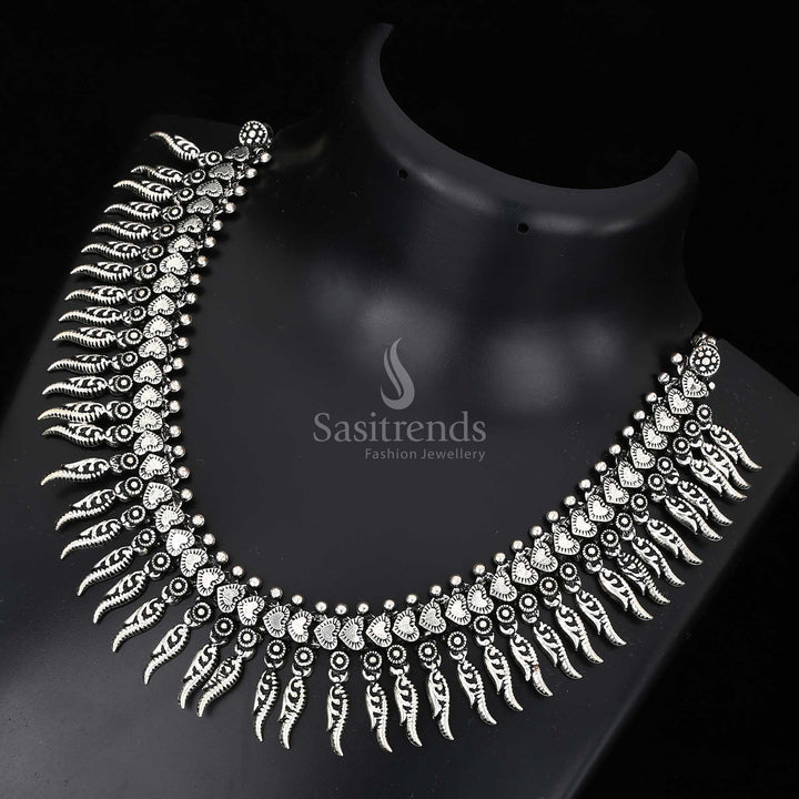 Vintage veins of legacy – oxidised silver Kolhapuri necklace with deep-carved pendant and folk aura, perfect for cultural and festive jewellery wear – Sasitrends