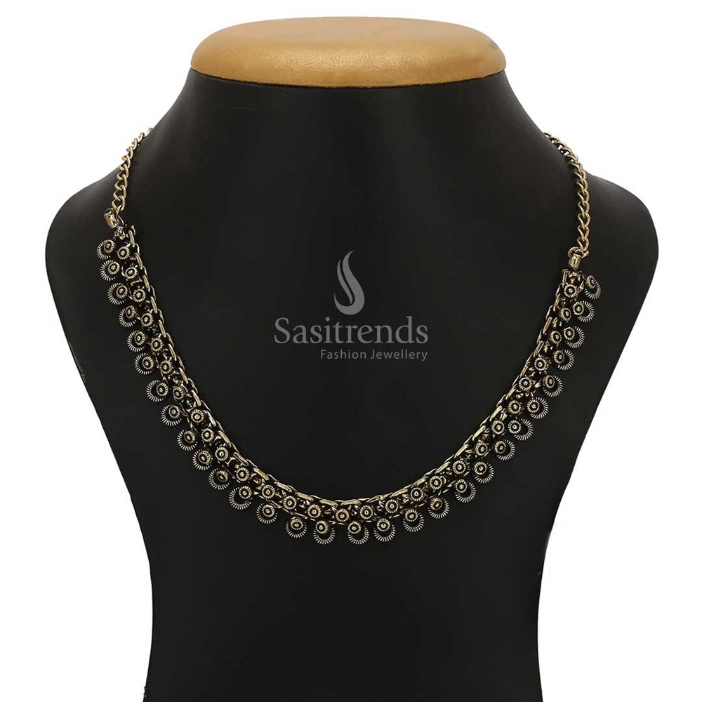 Tanvi oxidised antique gold finish choker necklace featuring tribal-inspired carved artistry – Sasitrends