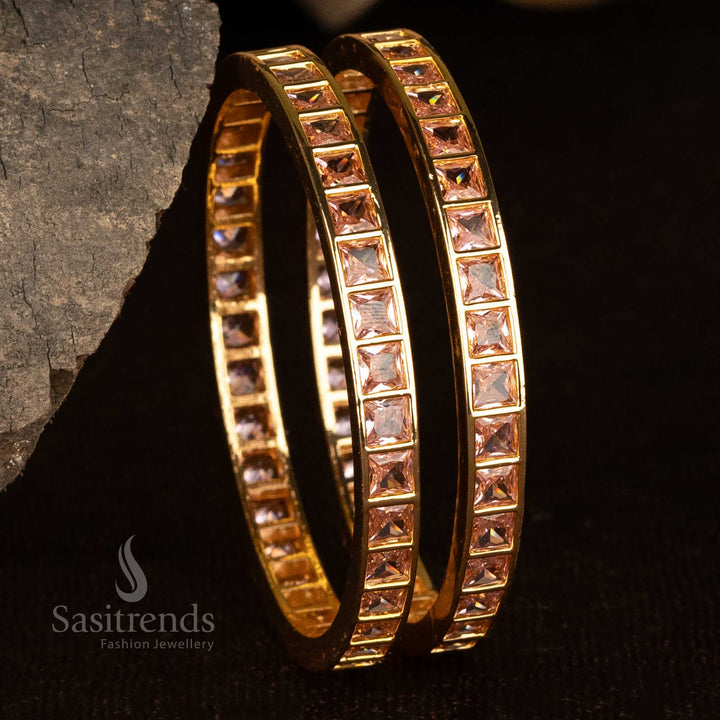 Royal pink American diamond bangles, micro gold-polished with a designer square pattern, an exquisite bridal jewellery selection for women - Sasitrends
