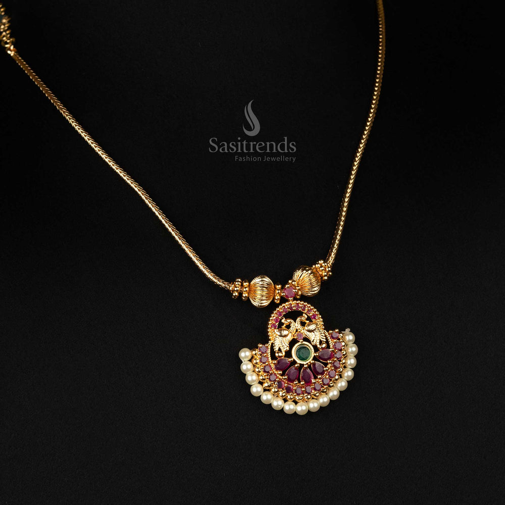 Traditional peacock necklace with micro gold plating, featuring an ornate pendant and colorful stone accents, radiating an opulent ethnic style - Sasitrends