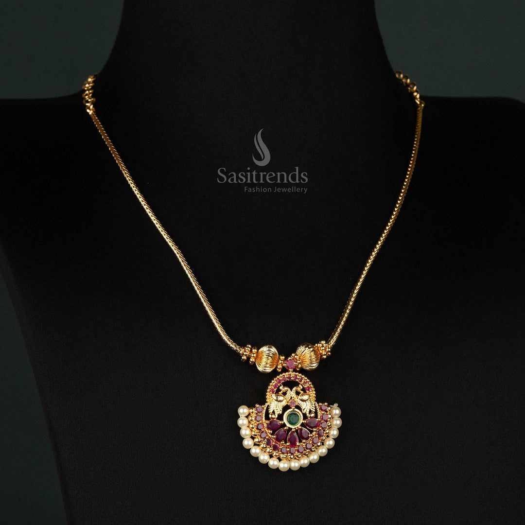 Micro gold-plated peacock pendant necklace with vivid enamel detailing and a dainty chain, exuding a lustrous regal design perfect for traditional celebrations - Sasitrends
