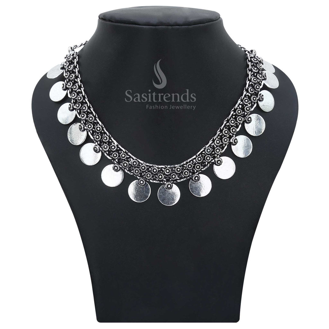 Royal whispers of ethnic legacy echo through this oxidised gapped plain coin necklace, flaunting rustic charm and tribal flair – a fusion-style traditional jewellery treasure – Sasitrends