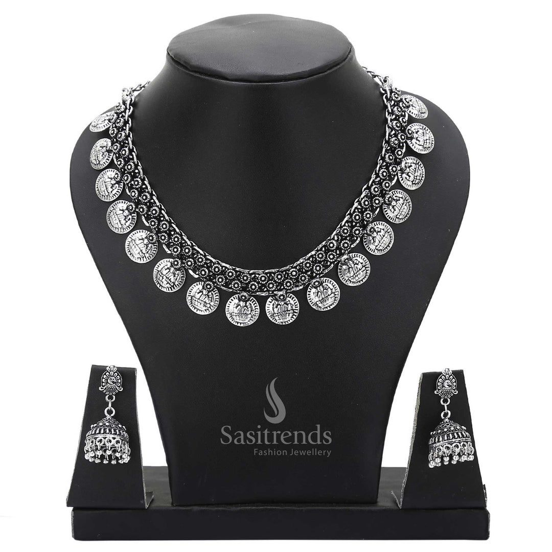 Ethnic Oxidised Silver Lakshmi Coin Necklace with Designer Peacock Jhumkas—a dual-tone temple jewellery set crafted for graceful appearances in traditional attire – Sasitrends