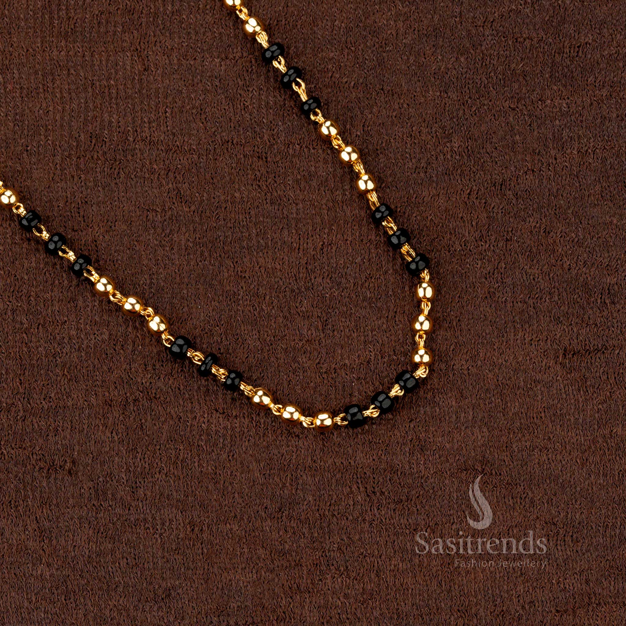 Traditional micro gold plated chain with black and gold beads, a beautiful accessory for any attire - Sasitrends