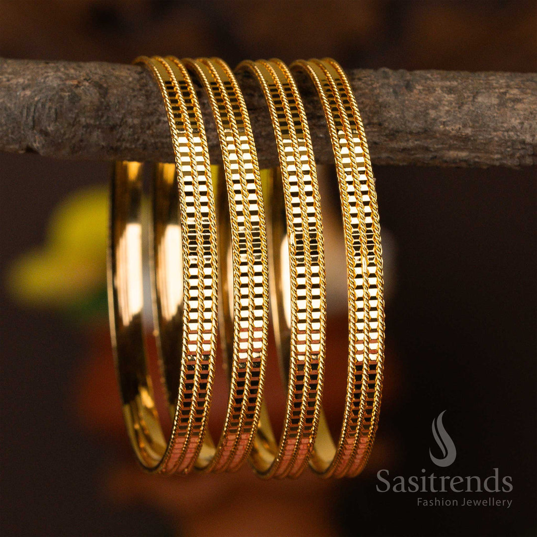 Set of four intricately textured micro gold-plated bangles