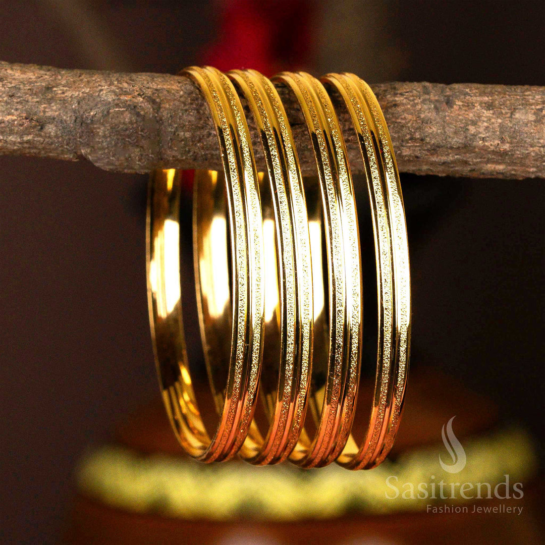 Set of four micro gold-plated bangles with classic line textures and guaranteed plating