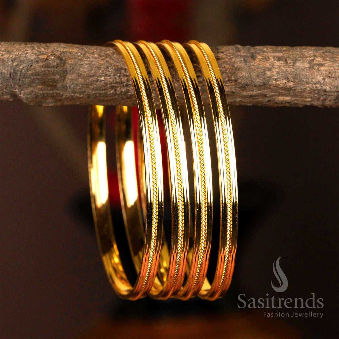Set of four micro gold-plated kada bangles with detailed texturing for an elegant finish.
