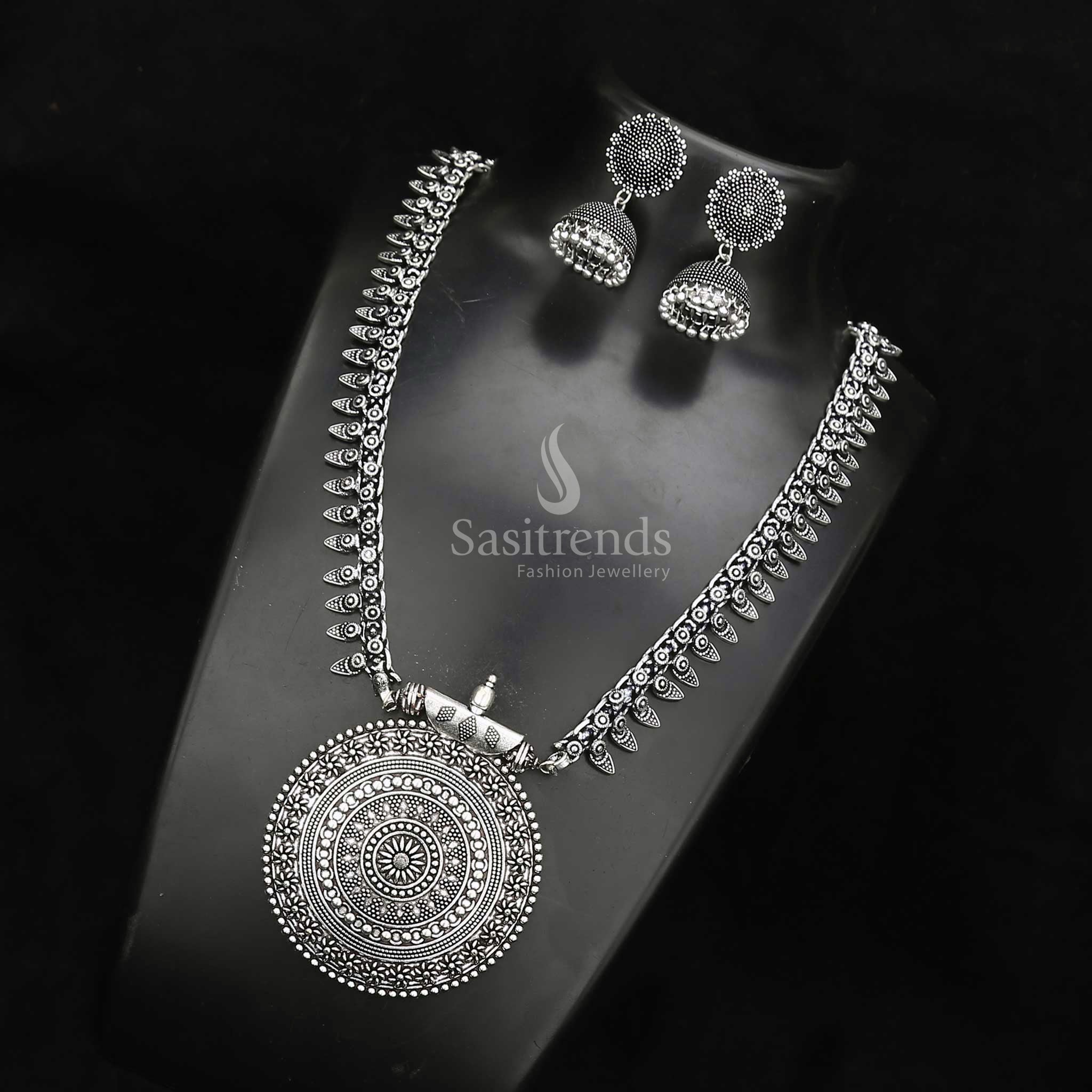 Elegant Oxidised Silver Niranjana Haram with Designer Nayanthara Jhumkas—a layered tribal jewellery set ideal for women and girls seeking ethnic grace – Sasitrends