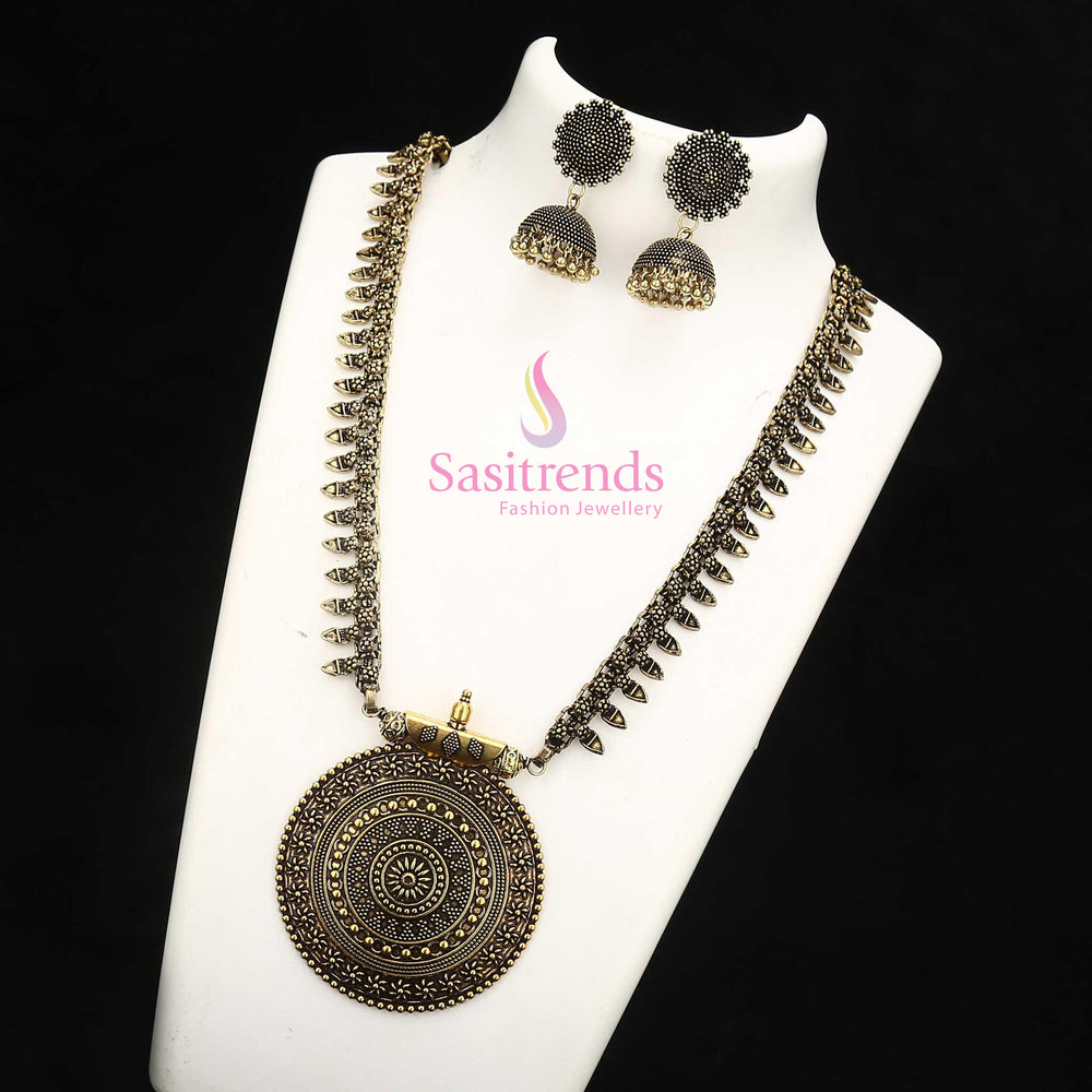 Majestic Antique Gold Niranjana Long Haram and Nayanthara Jhumka Earrings—a tribal temple-inspired jewellery set made for women who cherish tradition – Sasitrends
