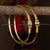 Gold-plated kada bangles with distinctive textured spheres