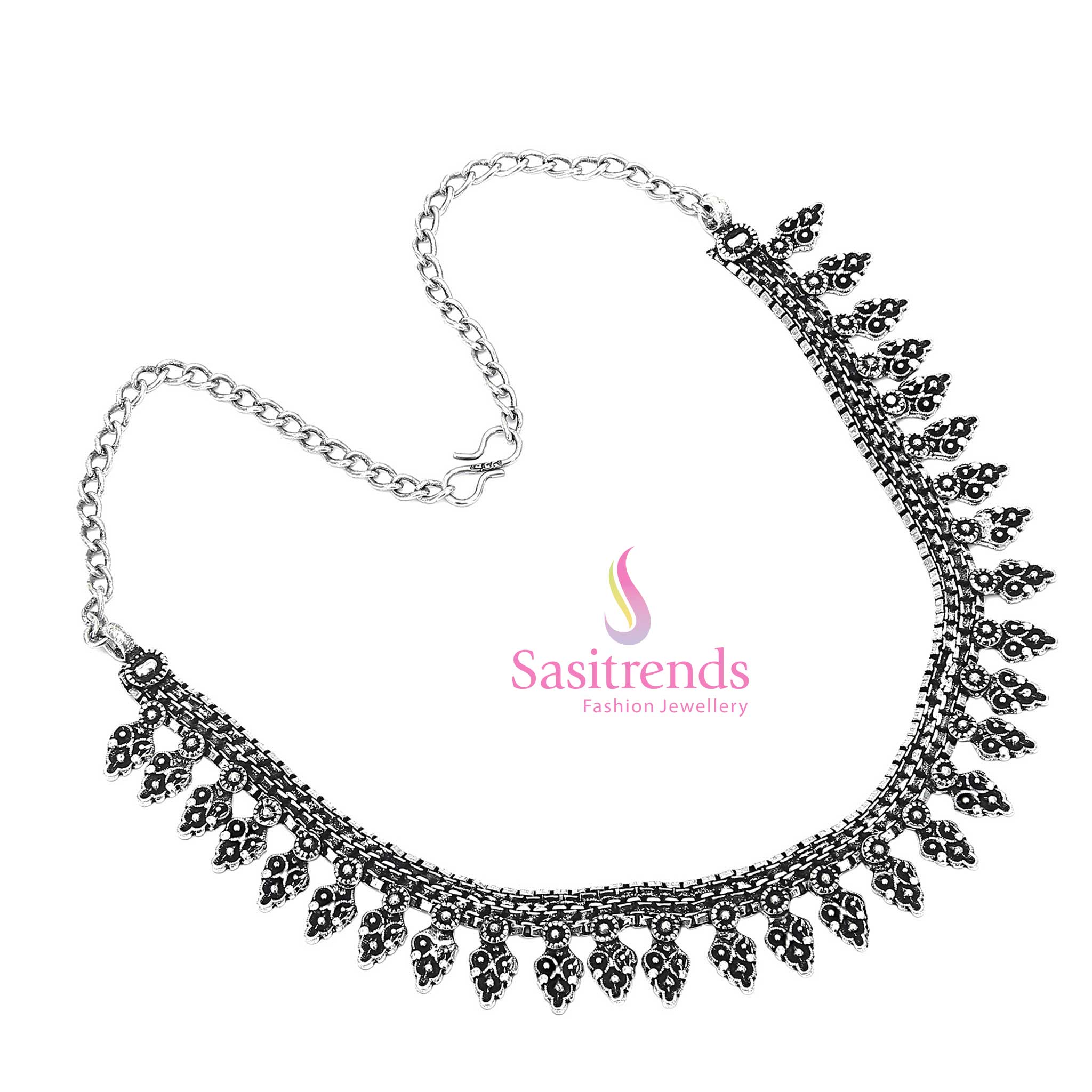 Nomadic song echoes in this oxidised chain necklace with a sunburst medallion and tribal hook closure – a soulful jewellery set for cultural dressings – Sasitrends