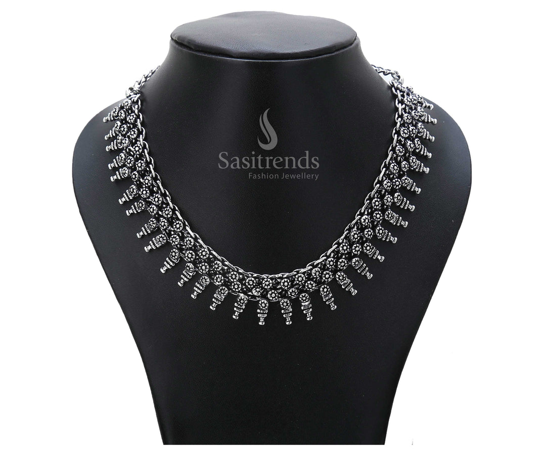 Vintage saga told through oxidised silver elegance – this ethnic ancestral necklace bears a mythical motif and dome-shaped drops for regal folkwear – Sasitrends