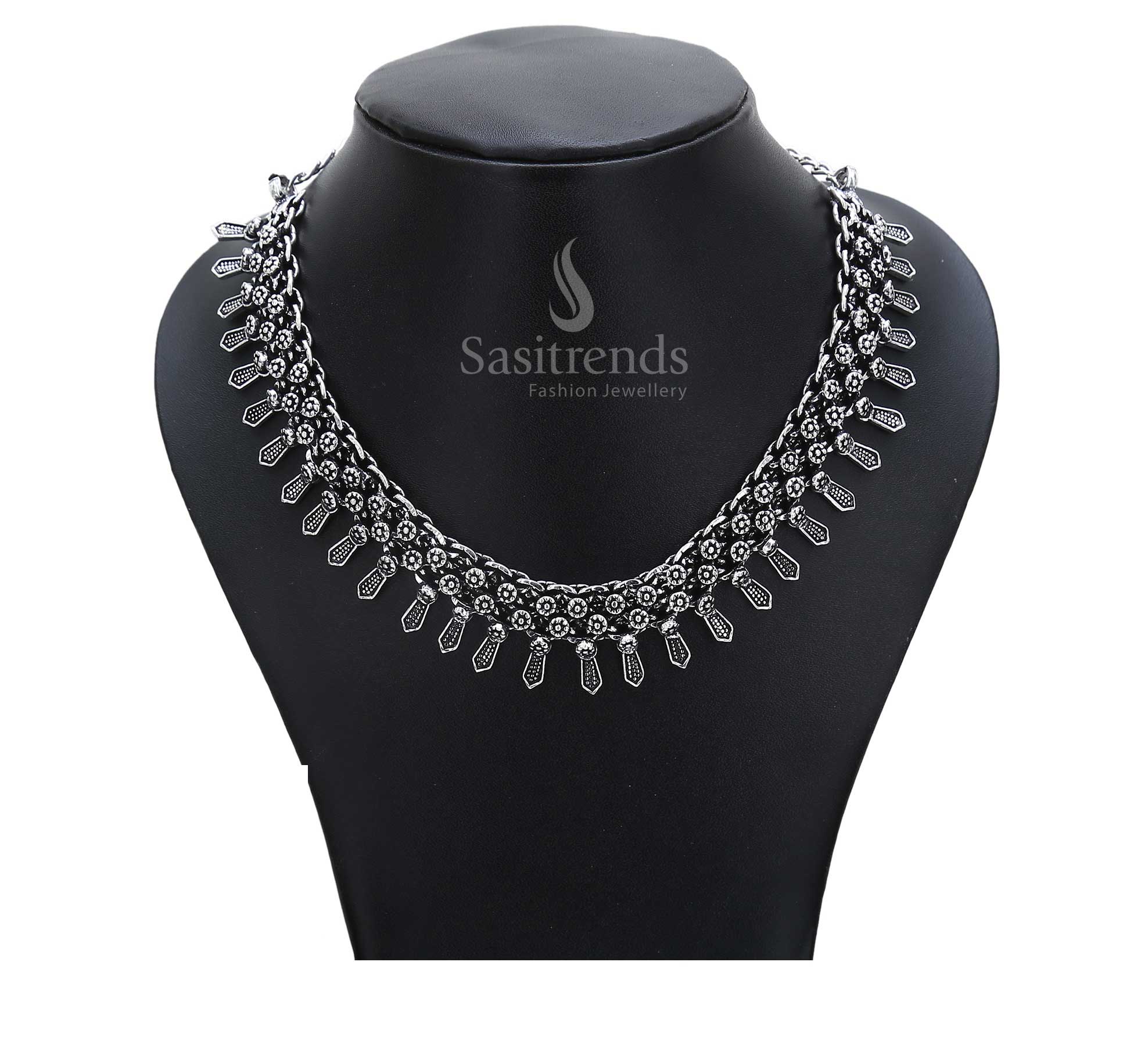 Eternal birthright echoed in oxidised vintage jewellery – tribal goddess pendant paired with textured silver orbs create ancestral grandeur – Sasitrends