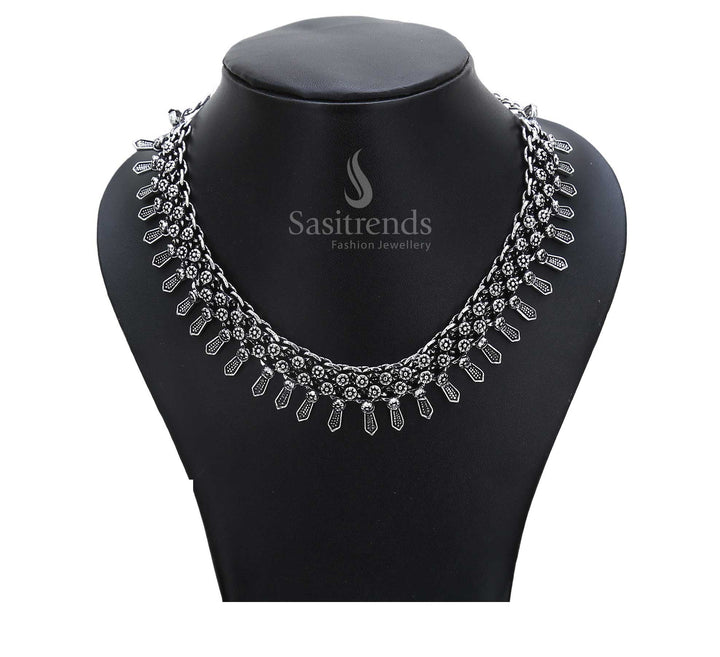 Eternal birthright echoed in oxidised vintage jewellery – tribal goddess pendant paired with textured silver orbs create ancestral grandeur – Sasitrends
