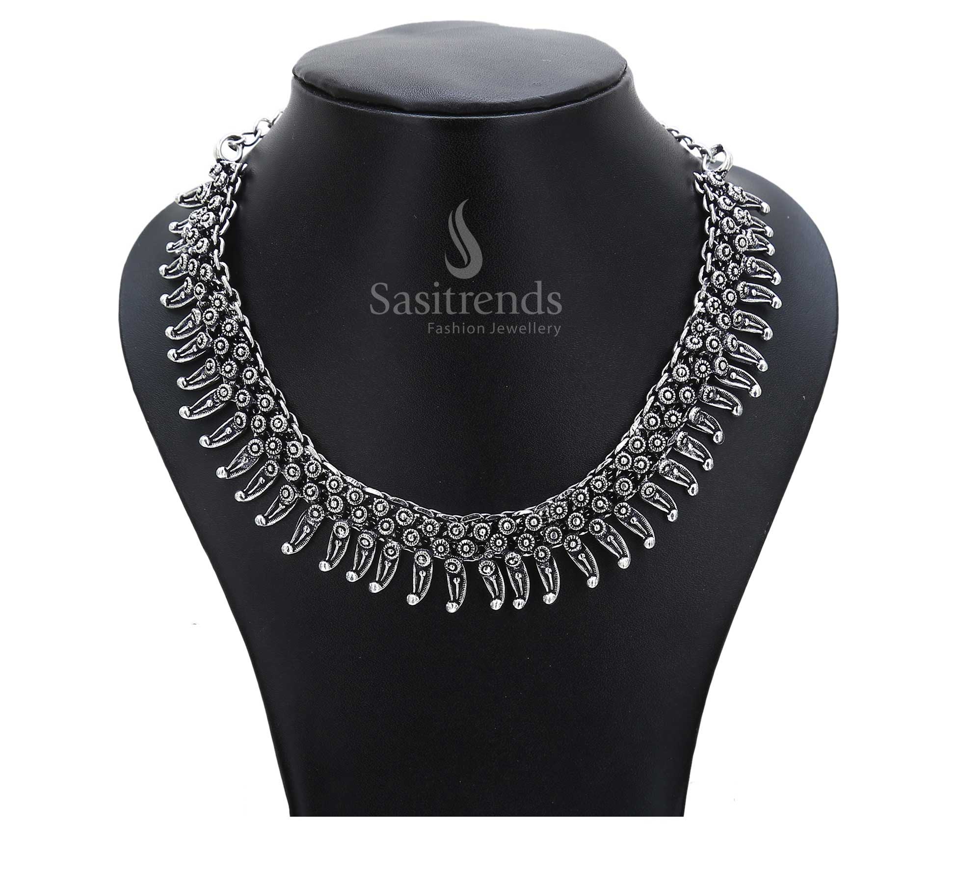 Ancestor melody plays on in this oxidised chain necklace with rustic drum-shaped pendants and ethnic circular motifs – inspired tribal jewellery – Sasitrends