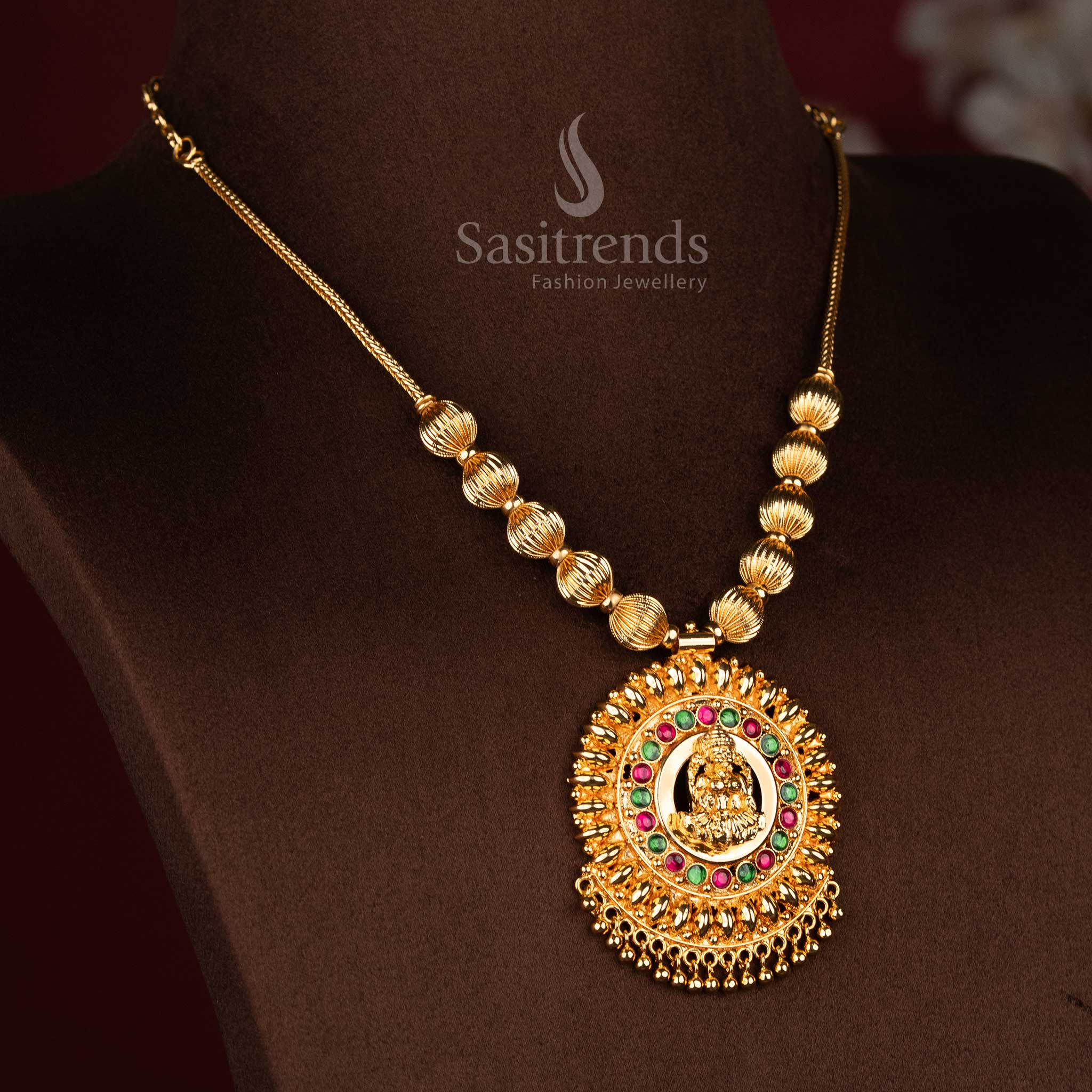 Traditional temple wear one gram micro gold plated Lakshmi pendant necklace with AD stones 