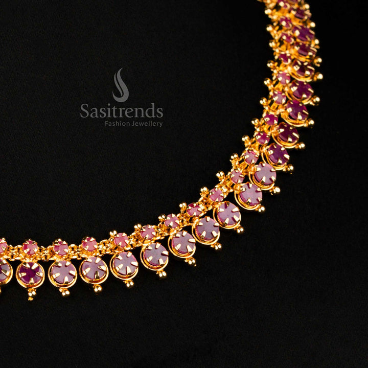 Regal micro gold plated American diamond necklace with soldered AD stones in a rich ruby colour, crafted in traditional Indian jewellery style for weddings and temple occasions – designer piece by Sasitrends

