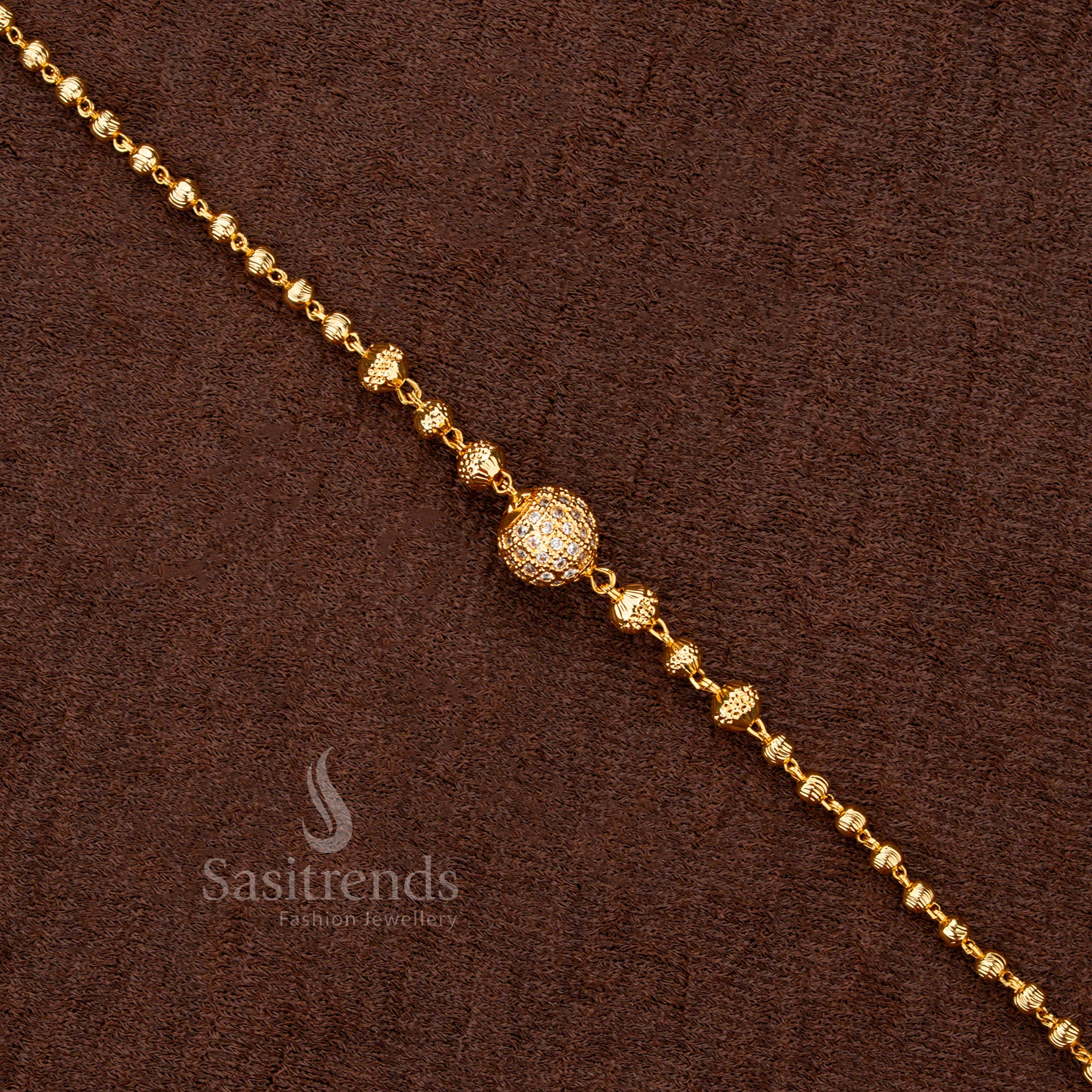 Micro gold plated bracelet with a bold arrangement of ball elements for a standout accessory - Sasitrends
