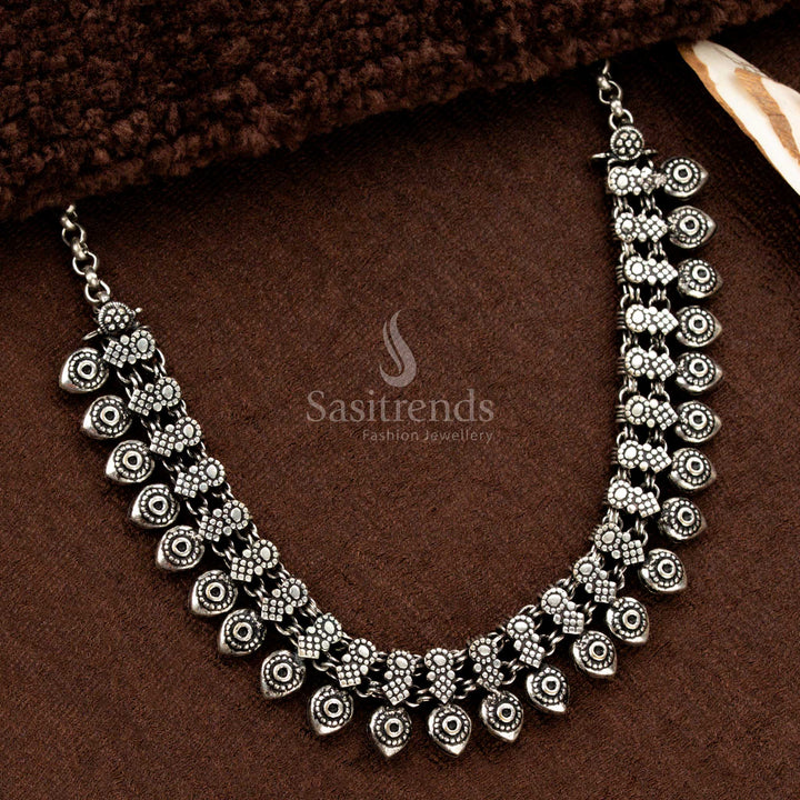 Elegant Oxidised German Silver Floral Chain Necklace with Eye Drop Hanging Beads – Traditional Kolapuri Inspired Necklace Design - Sasitrends