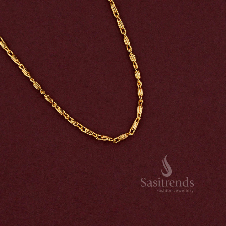 Sleek micro gold plated everyday textured link chain guaranteed to look like real gold resting on a dark background - Sasitrends.
