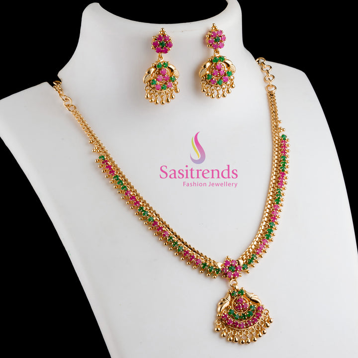 Heritage Ruby-Green AD Studded Flower Design Micro Gold-Plated Jewellery Set With Statement Necklace and Jhumka Earrings – A Traditional Splendour for Cultural Occasions by Sasitrends

