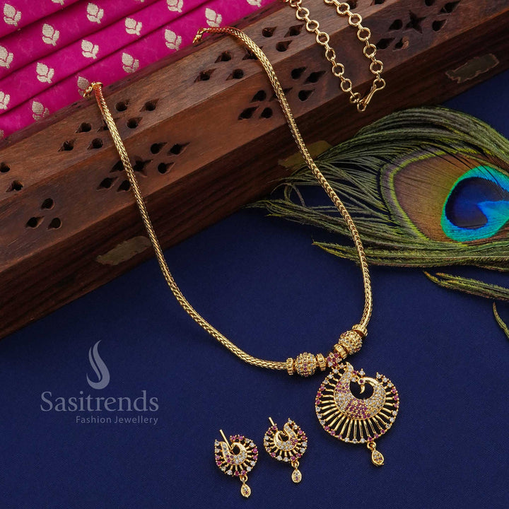 Delicate and graceful white and ruby peacock pendant ball jewellery set, micro gold plated and adorned with glittering American diamonds - Sasitrends
