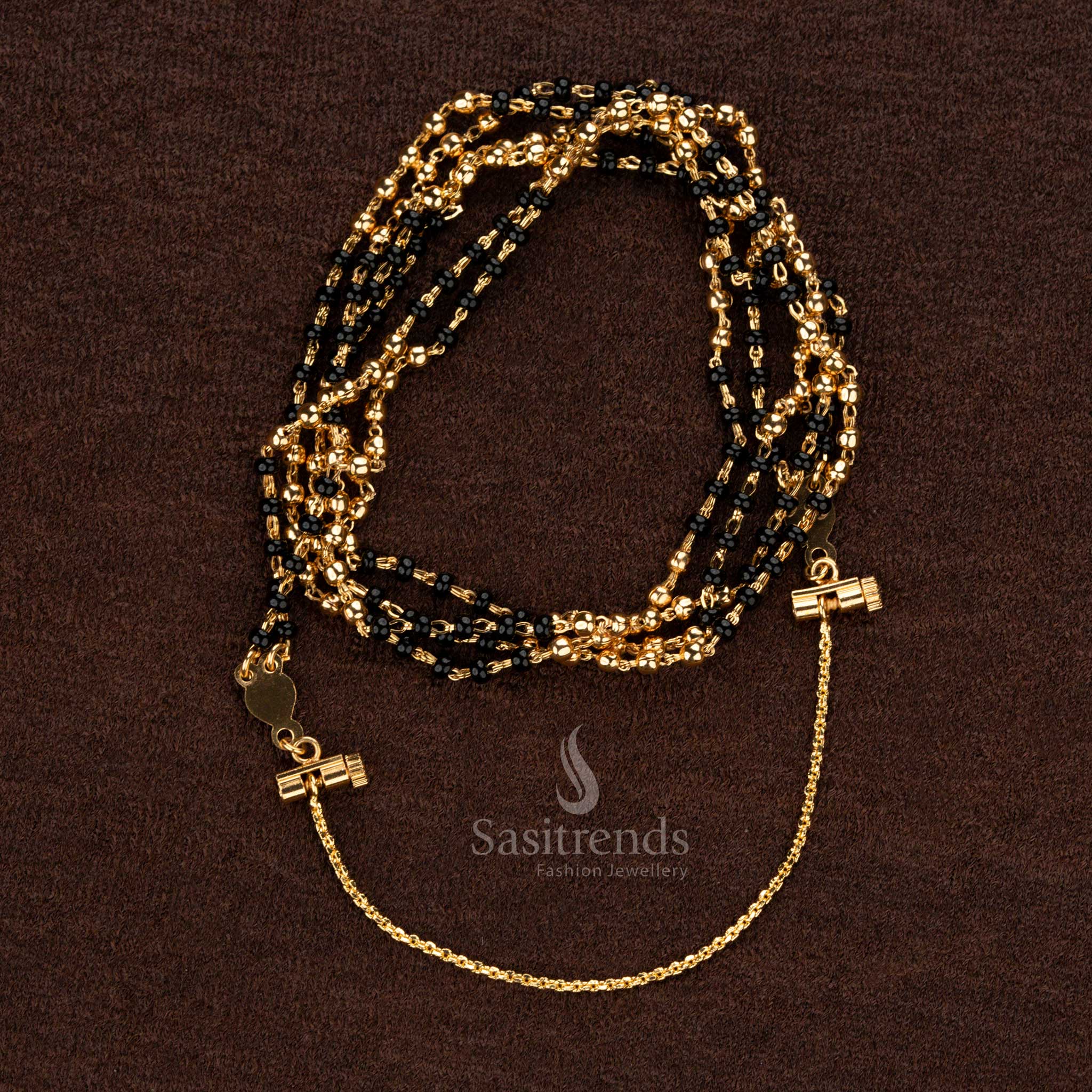 Stunning double-layered Thali Saradu chain featuring intricate black beads and golden accents, ideal for ethnic ceremonies and special events - Sasitrends