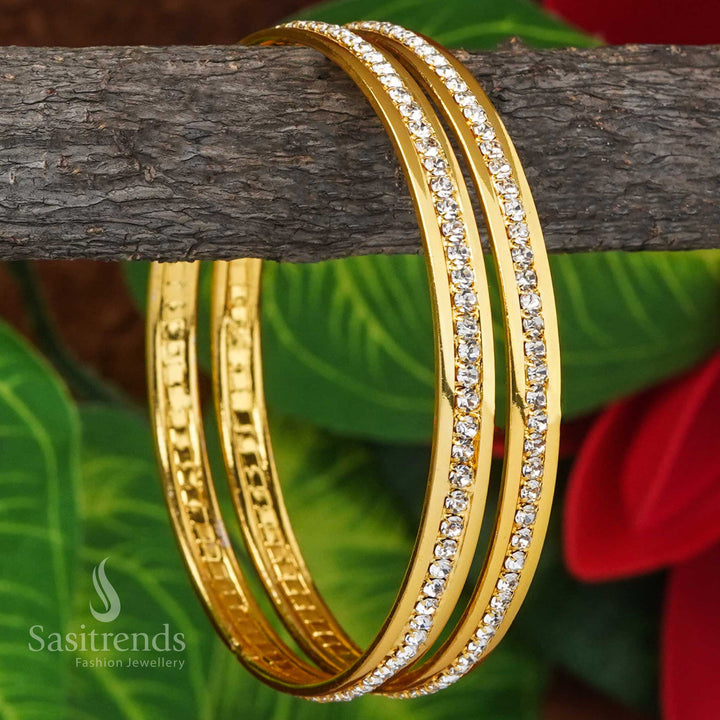 Glamorous white micro gold plated traditional bangles pair, adorned with sparkling stones for an enchanting bridal and festive jewellery statement - Sasitrends
